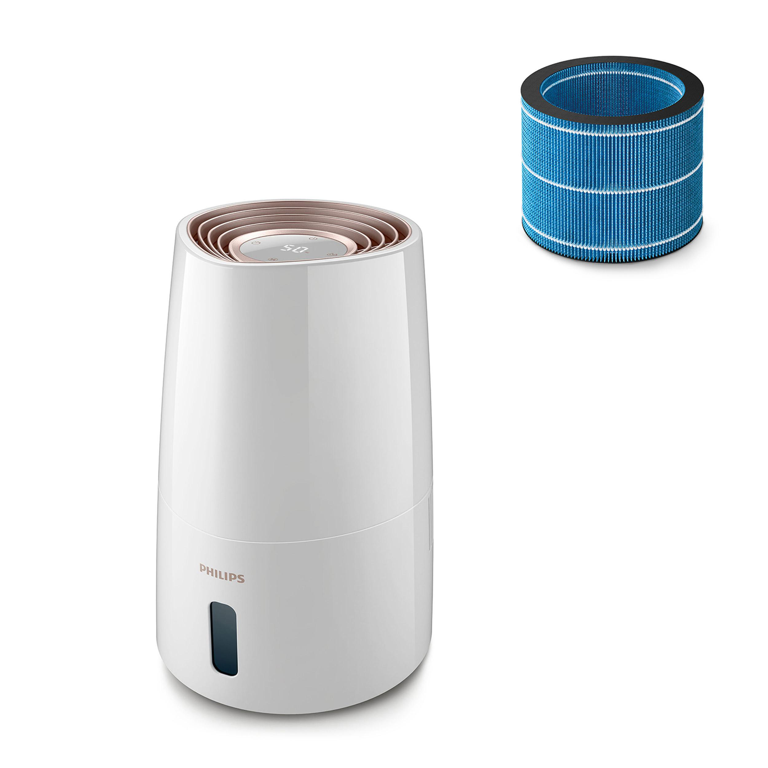 Weißer Philips Luftbefeuchter mit blauem Filter daneben. Roségold Akzente oben.