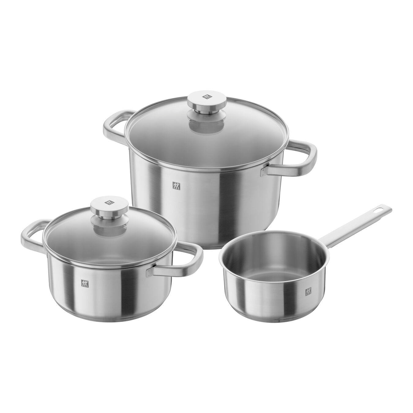 Set aus drei Edelstahltöpfen mit Deckeln.