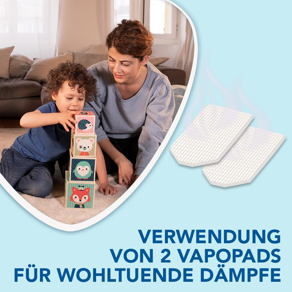 Mutter und Kind stapeln Blöcke. Zwei VapoPads rechts. Text: 2 VapoPads für Dampf.