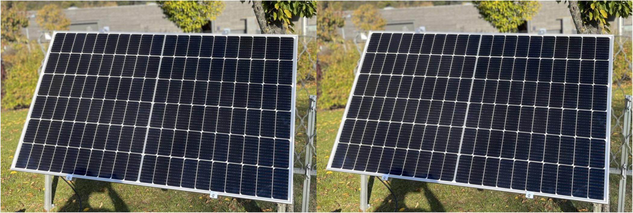 Zwei Solarpaneele auf Gras installiert bei Tageslicht.