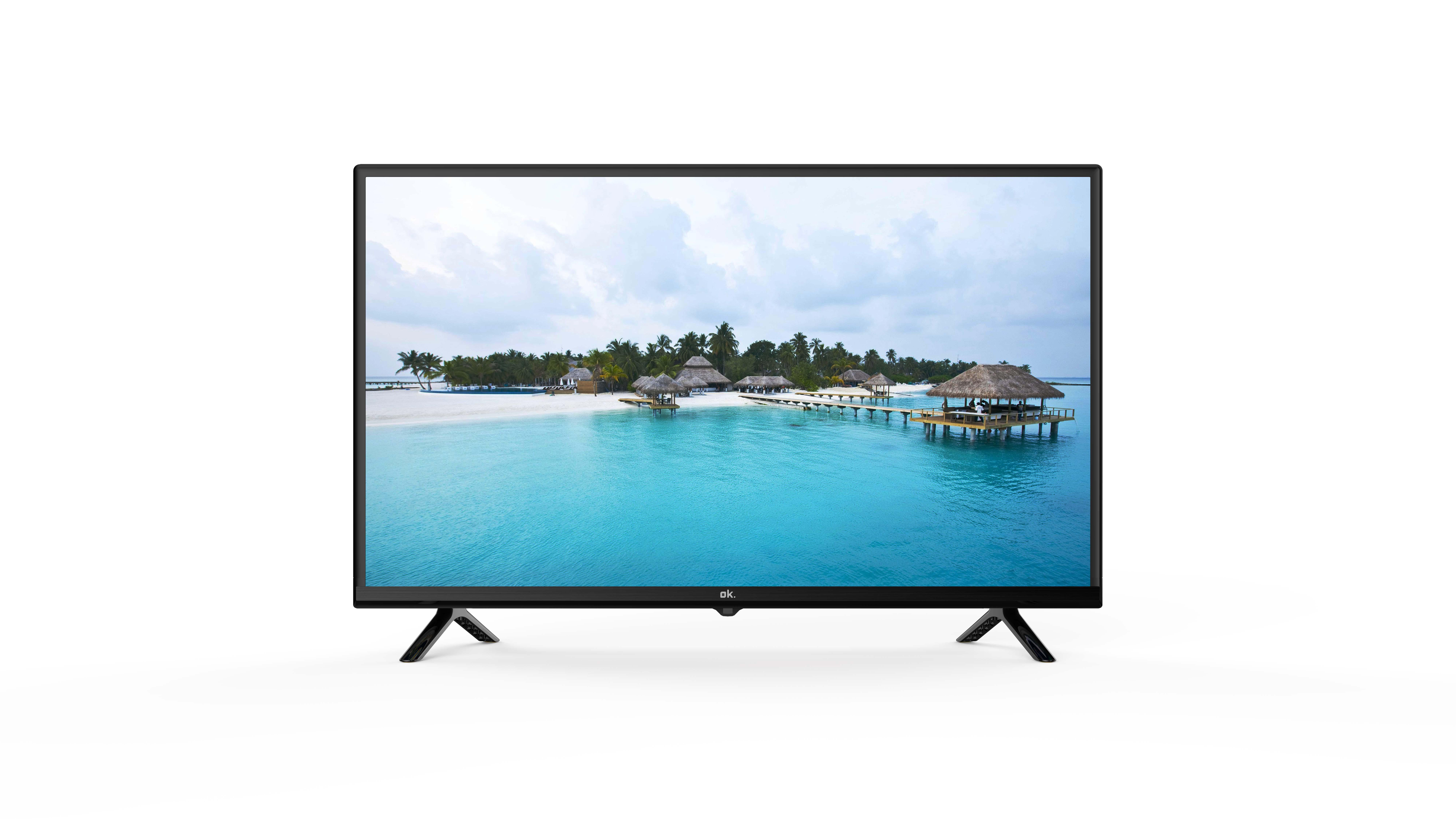 Ein Flachbildfernseher, der eine Strandszene mit türkisfarbenem Wasser und klarem Himmel zeigt.