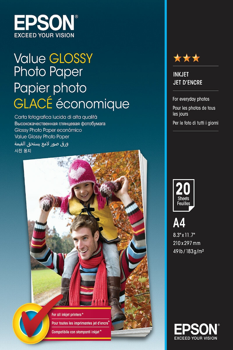 Papier fotograficzny ze zdjęciem dziewczynki na ramionach ojca. Tekst w wielu językach.
