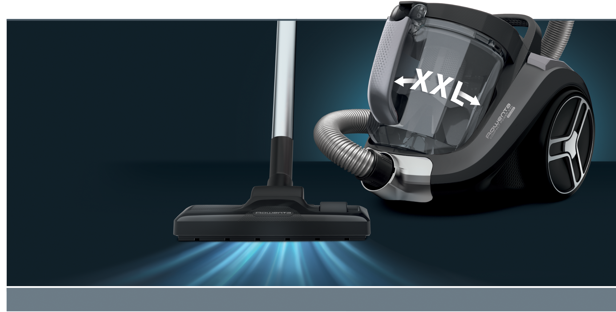 Porszívó XXL felirattal az átlátszó portartályon.