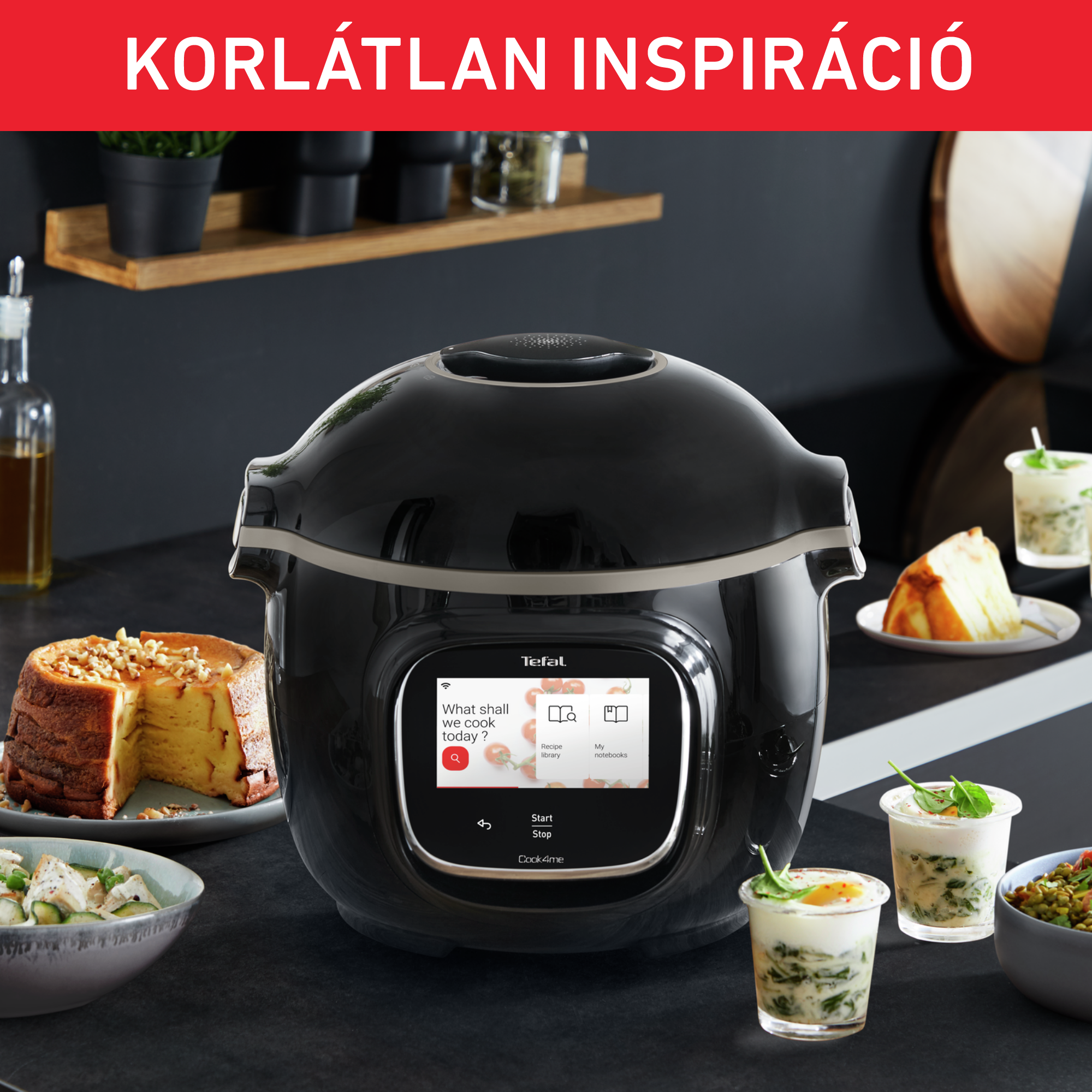 Fekete Tefal többcélú főzőgép kijelzővel, ételekkel körülvéve.