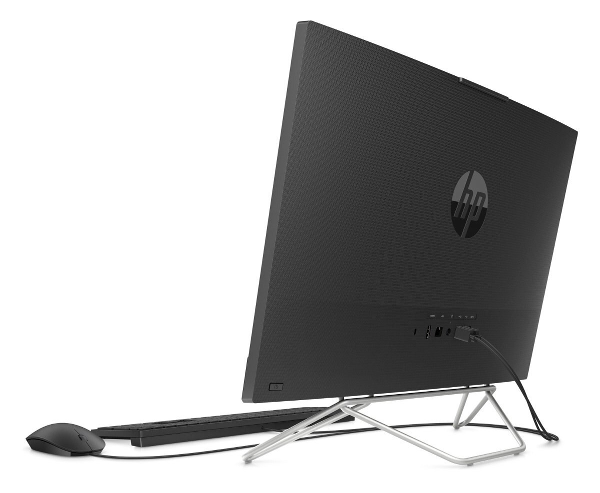 Czarny komputer HP all-in-one od tyłu z klawiaturą i myszą. Białe tło.