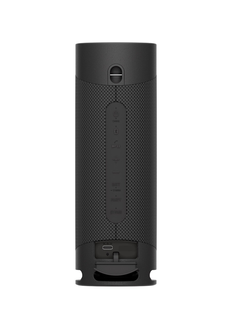 Czarny głośnik cylindryczny, przyciski i port USB. Głośnik ma siatkową teksturę.