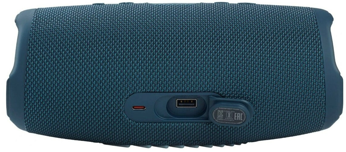 Niebieski głośnik JBL widziany z tyłu, pokazujący porty.