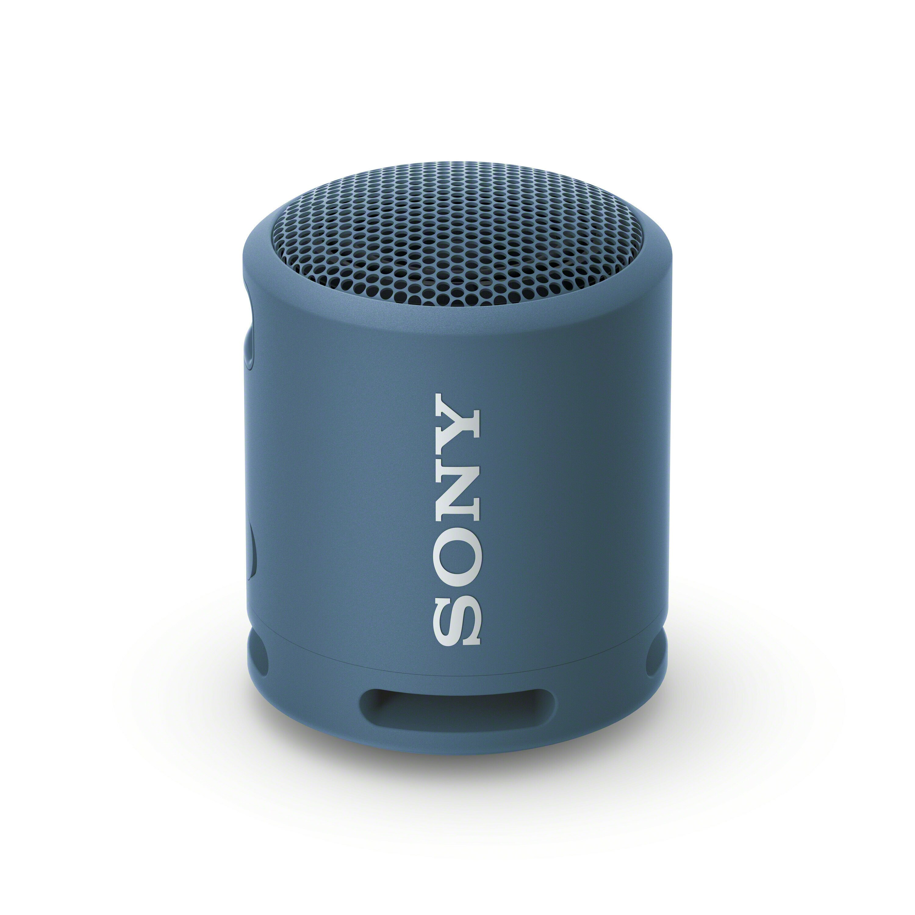 Mały niebieski głośnik Sony. Kształt walca. Widoczny srebrny napis 'SONY'.
