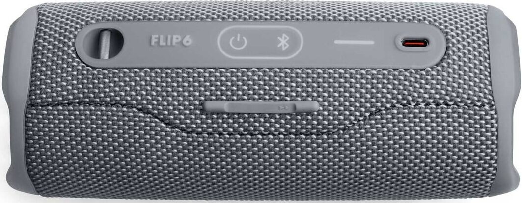 Szary głośnik JBL Flip 6 z przyciskami sterowania na górze.