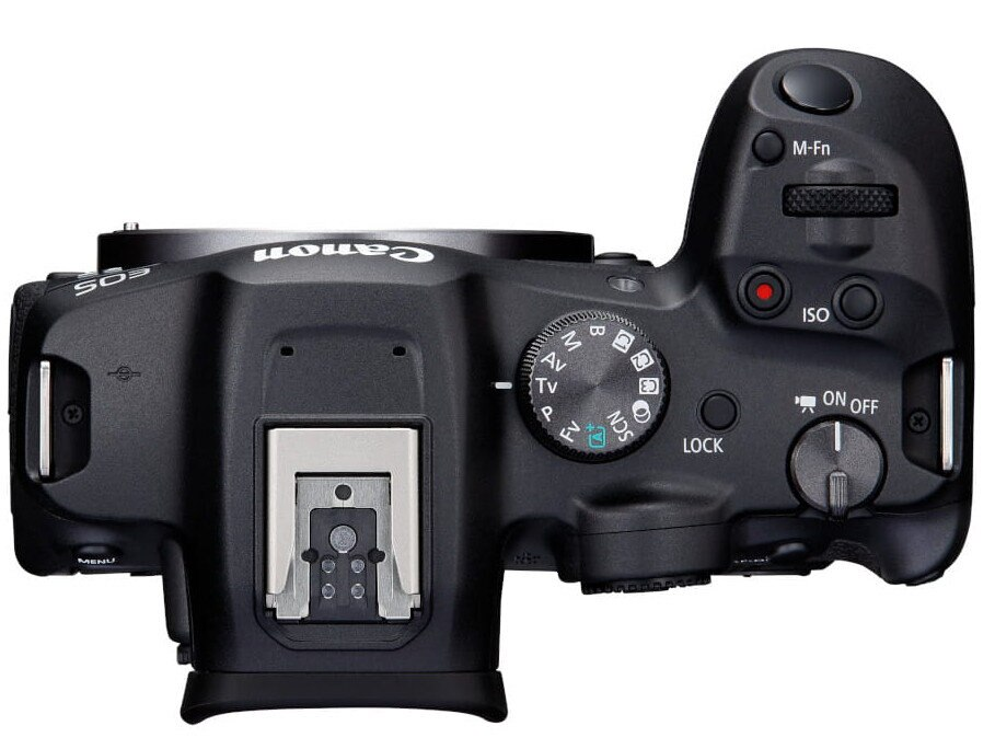 Aparat Canon EOS, widok z góry, z przyciskami i pokrętłami do regulacji, czarny korpus.