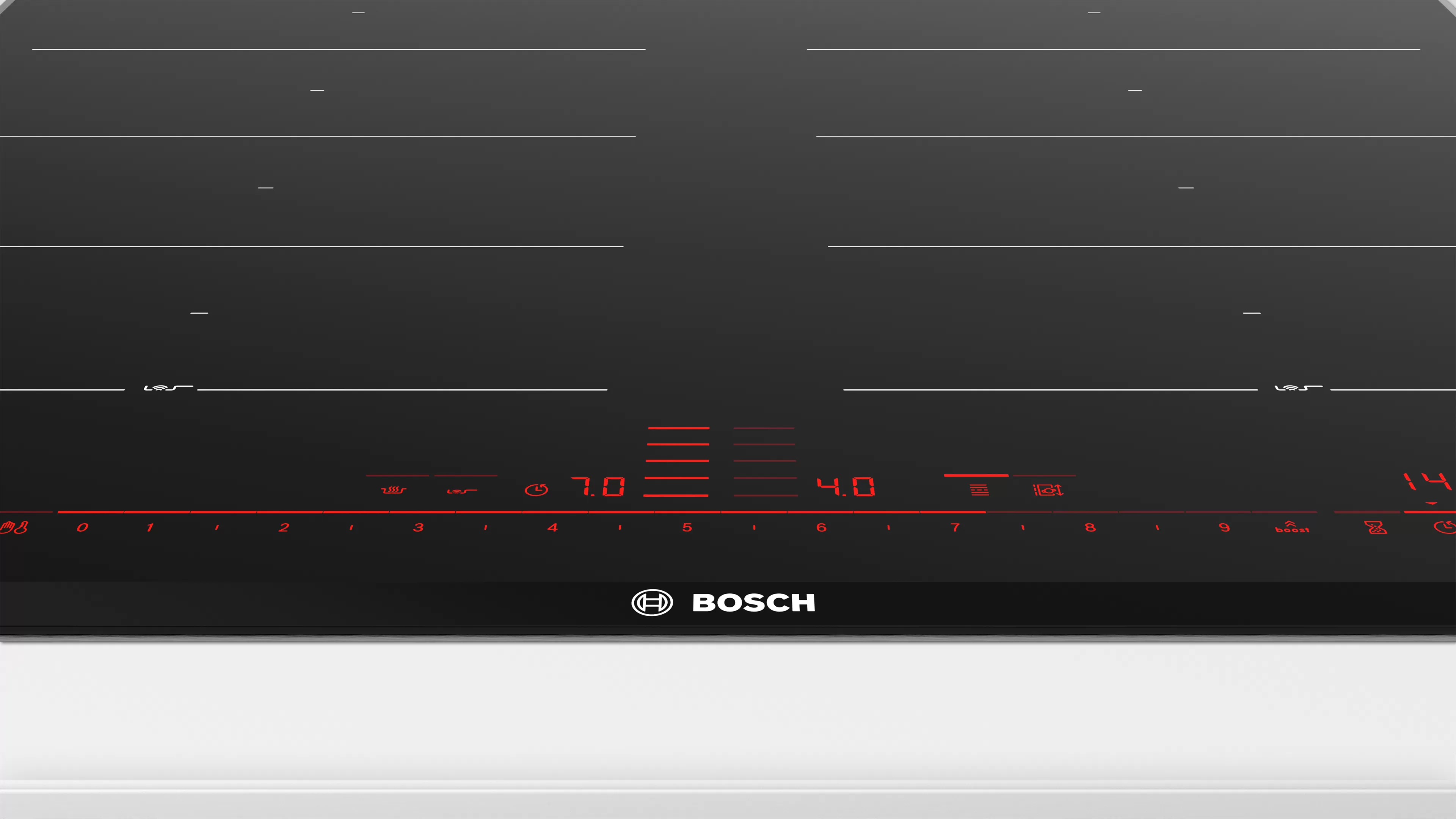 Fekete indukciós főzőlap piros kijelzőfényekkel és a Bosch logójával.