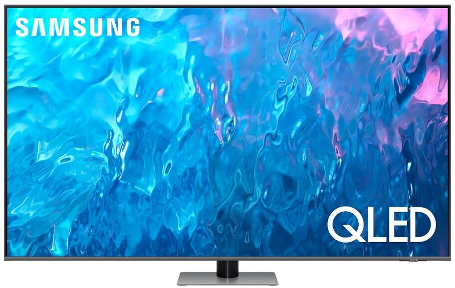 Duży, płaski ekran telewizora Samsung QLED. Ekran wyświetla żywy, niebiesko-różowy abstrakcyjny wzór.