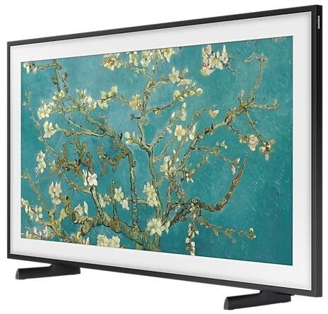 Czarna telewizja w ramie z obrazem drzewa z białymi kwiatami.