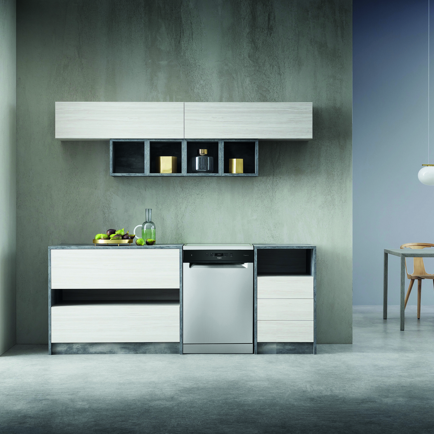 Modern kitchen interior with cabinets, a dishwasher, and decor.