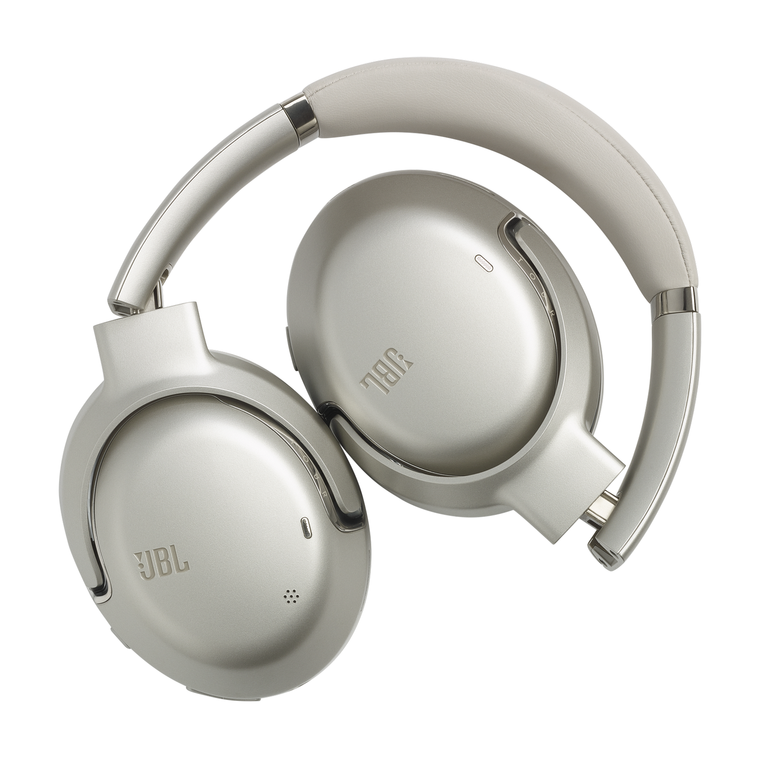 Silver JBL headphones, folded and displayed against a black background.