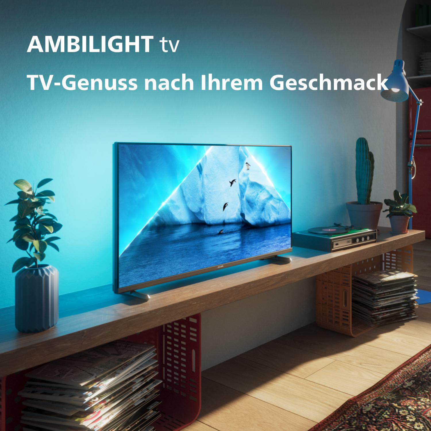 Ein Fernseher mit Ambilight, zeigt eine blaue Eisbergszene. Text ist sichtbar.