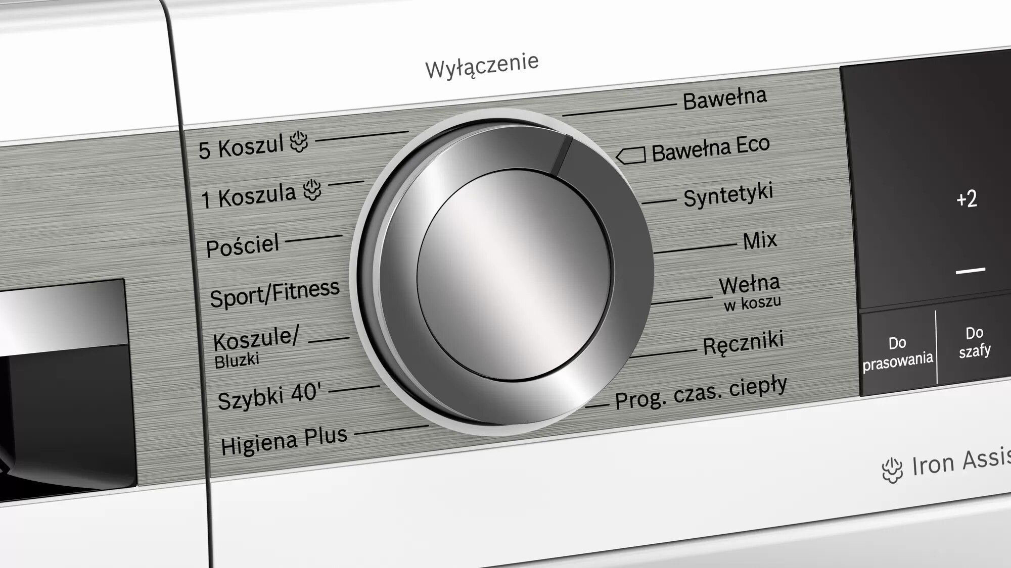 Panel sterowania pralki z pokrętłem i etykietami tekstowymi w obcym języku.