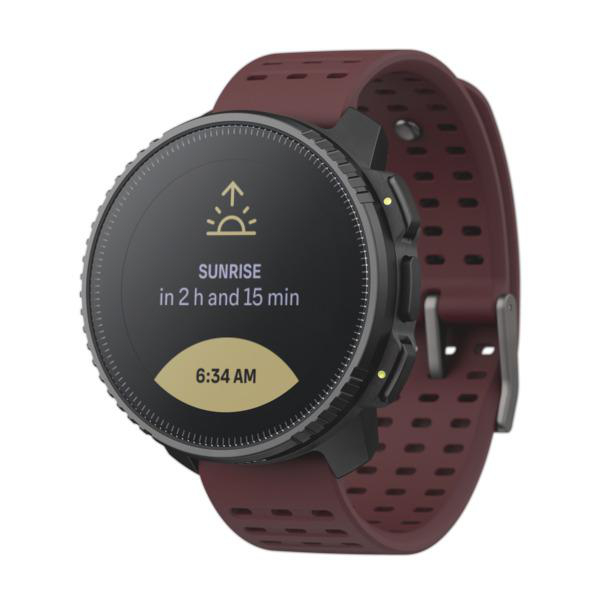 Eine schwarze und kastanienbraune Suunto Smartwatch, die die Sonnenaufgangszeit in 2 Stunden und 15 Minuten anzeigt.