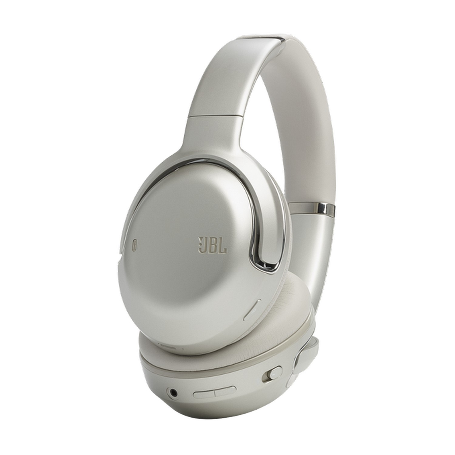 Casque JBL argenté. Les oreillettes sont grandes et ovales. Le fond est blanc.