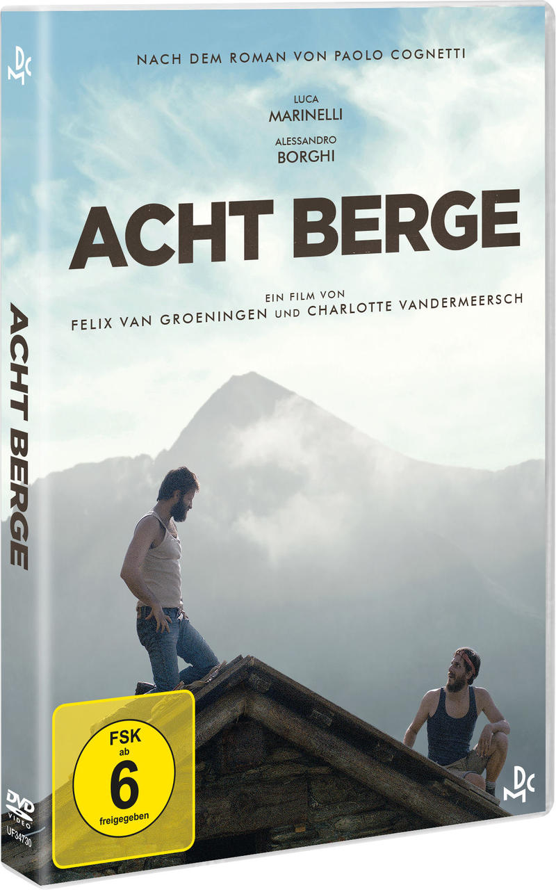 DVD-Cover von zwei Männern auf einem Gebäude und einem Berg im Hintergrund.