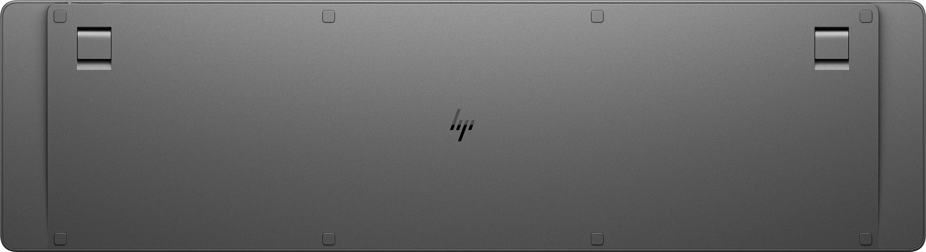 Unterseite einer grauen Tastatur. HP-Logo in der Mitte. Zwei Füße auf jeder Seite.