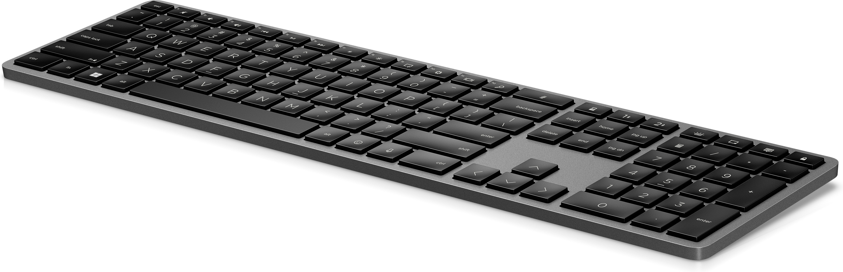Eine graue Tastatur in voller Größe mit schwarzen Tasten und einem Nummernblock.