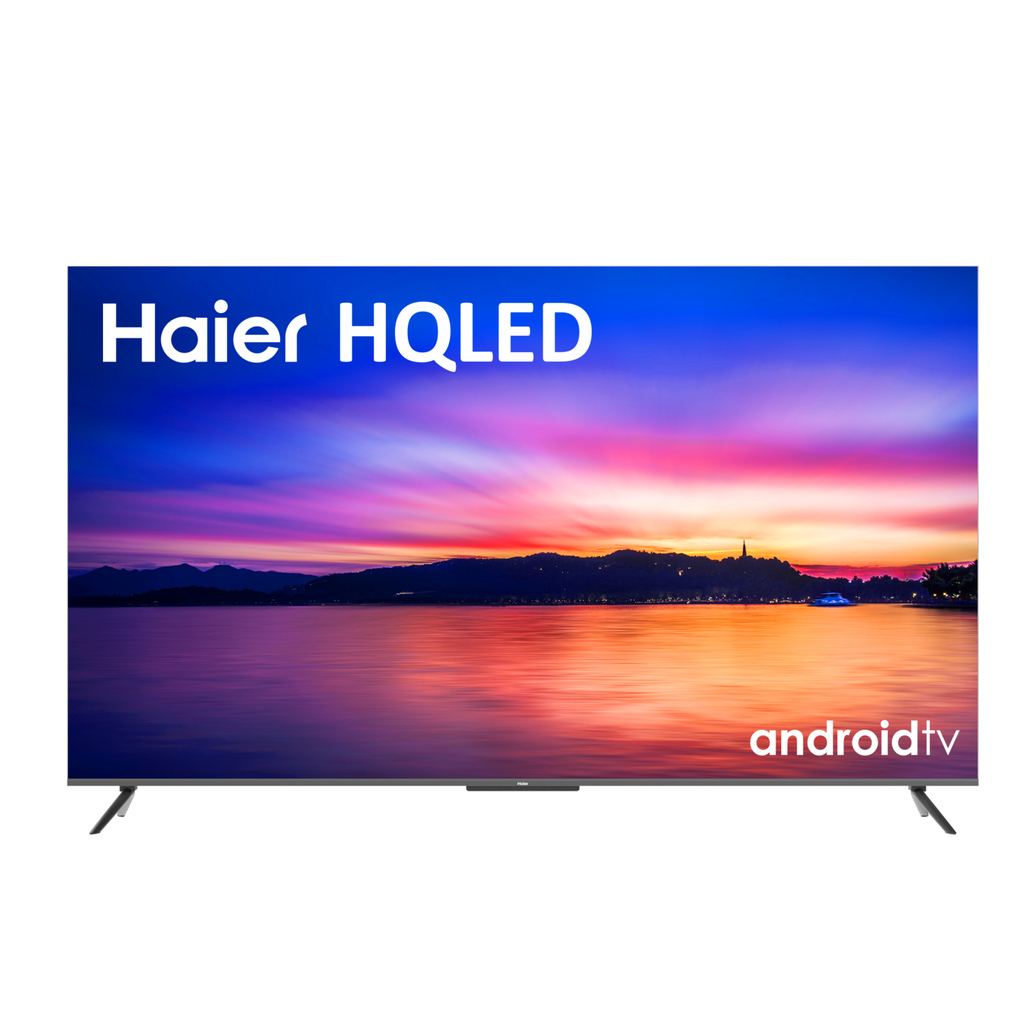 TV Haier HQLED que muestra una colorida puesta de sol sobre el agua. La palabra 'androidtv' es visible.
