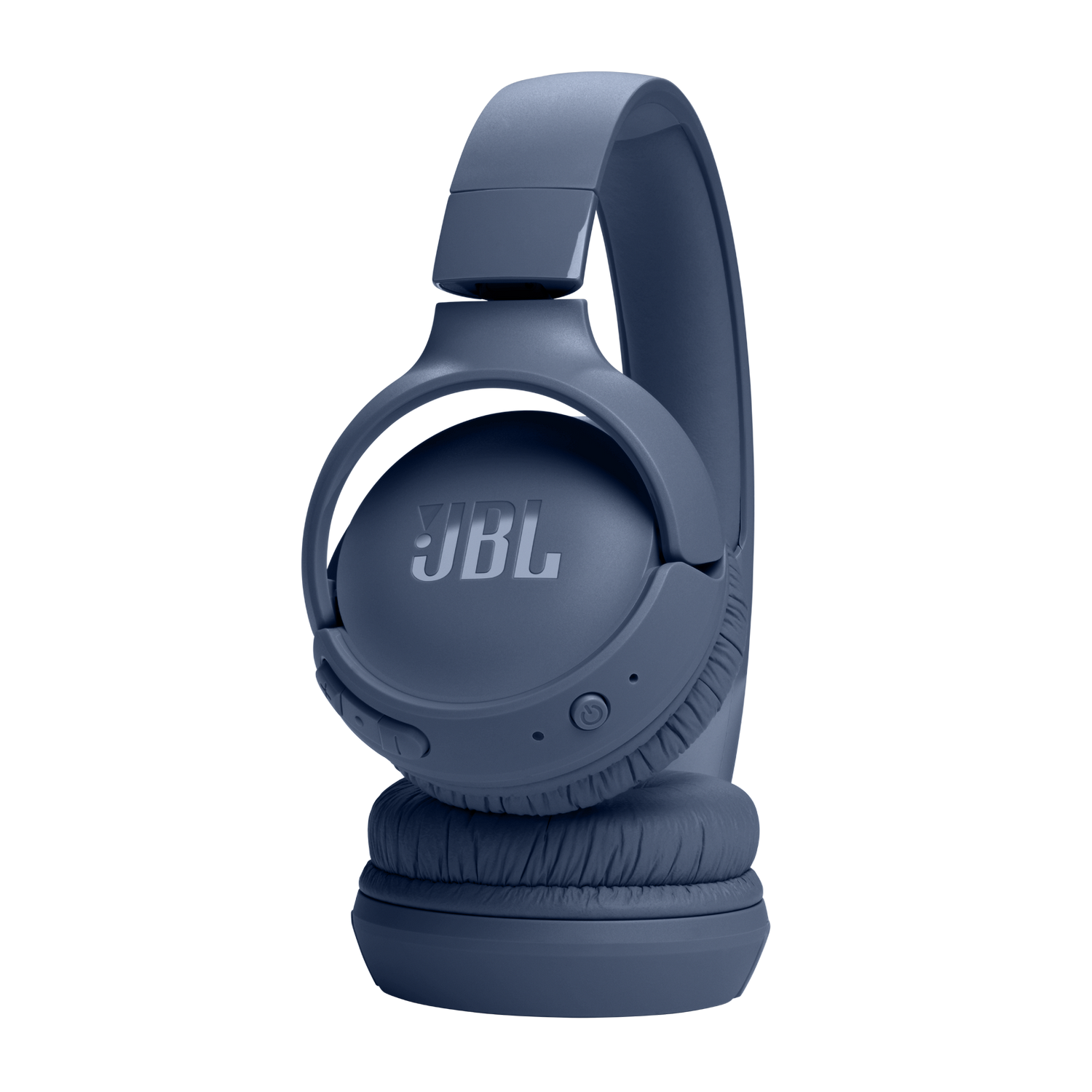 Blue JBL headphones. Black background.