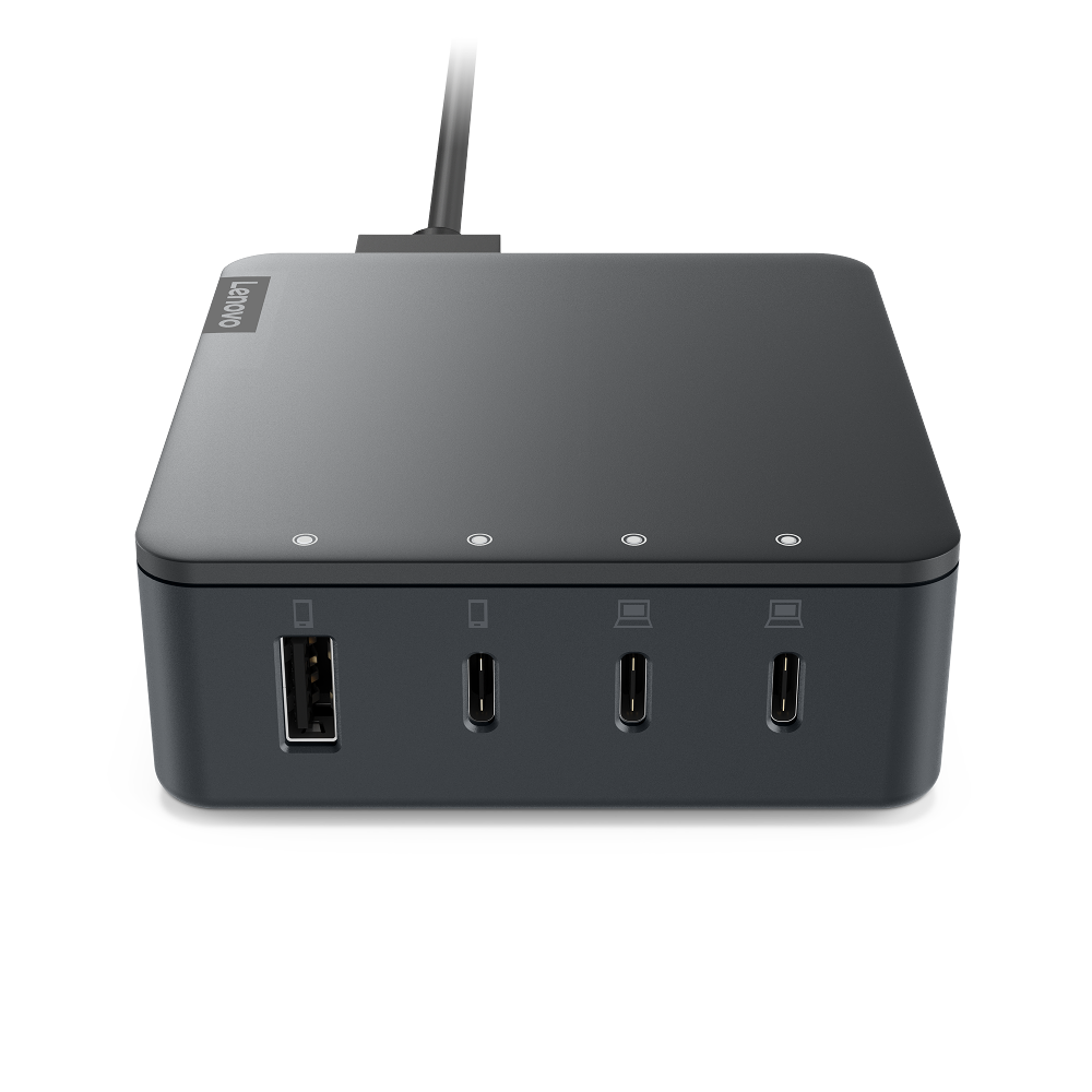 Una estación de acoplamiento Lenovo gris oscuro con múltiples puertos. Tiene un puerto USB, tres puertos USB-C y un cable de alimentación.