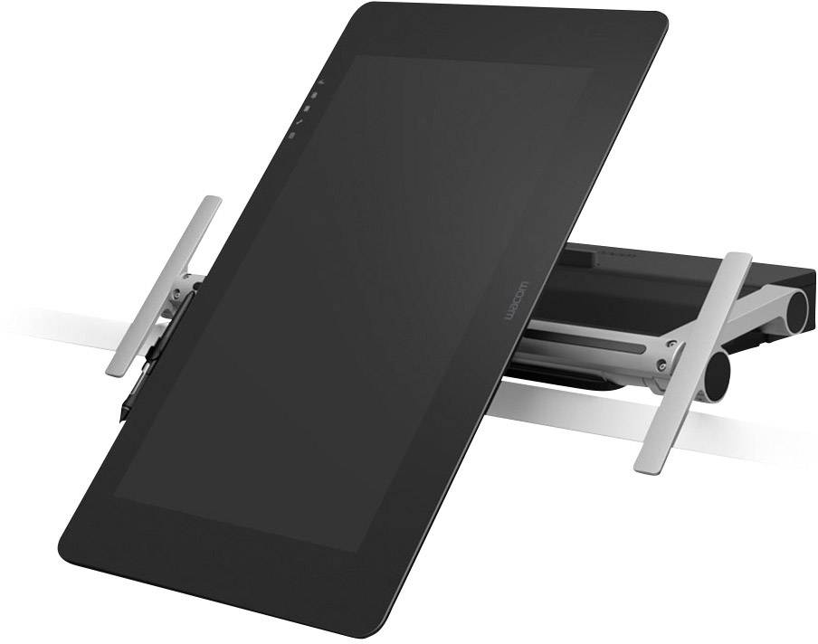 Una tableta de dibujo negra en un soporte blanco, inclinada hacia arriba.