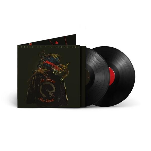 Album borító egy kabát dizájnnal, két fekete bakelit lemezzel és egy fekete album borítóval.