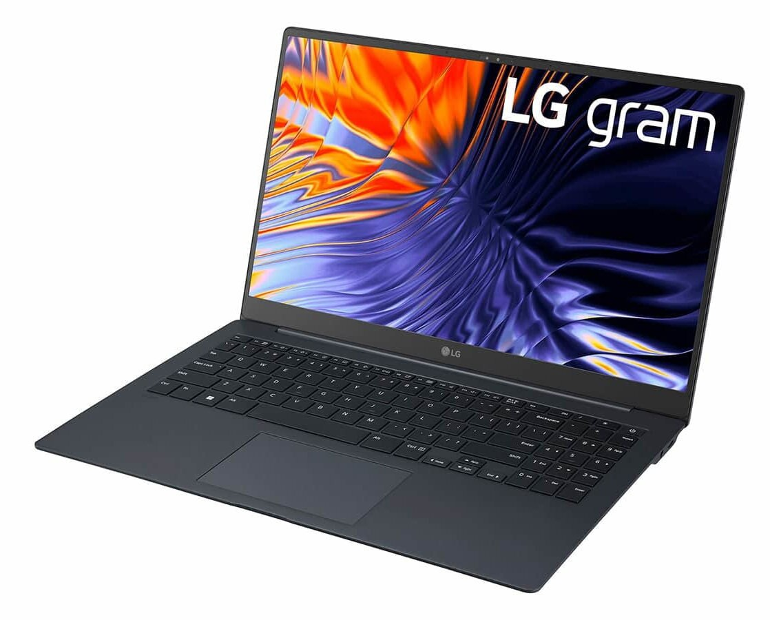 Laptop LG gram. Ekran wyświetla kolorowy abstrakcyjny obraz. Widoczna klawiatura i touchpad.