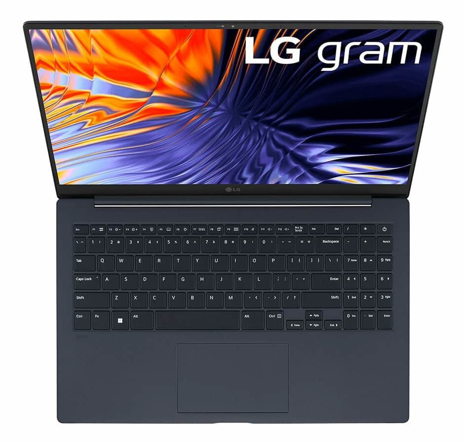 Widok z góry na niebieski laptop z otwartym ekranem.