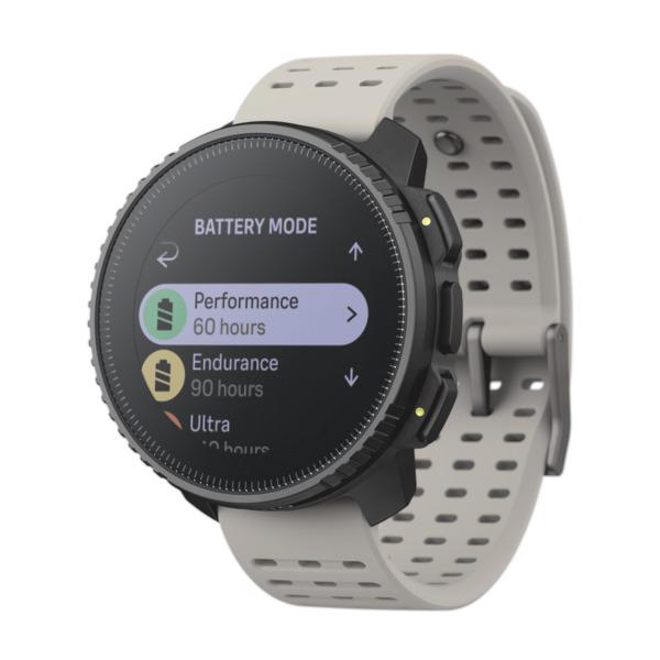 Smartwatch mit schwarzer Lünette und grauem Armband, zeigt Batteriemodi.