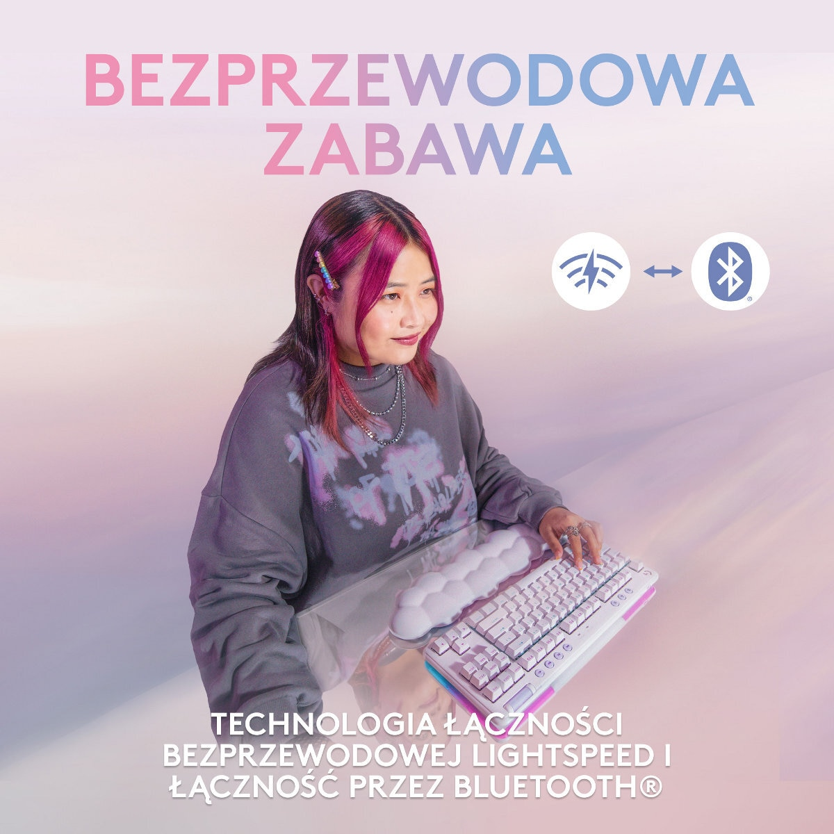 Kobieta z różowymi włosami używa białej klawiatury. Ikony technologii bezprzewodowej.