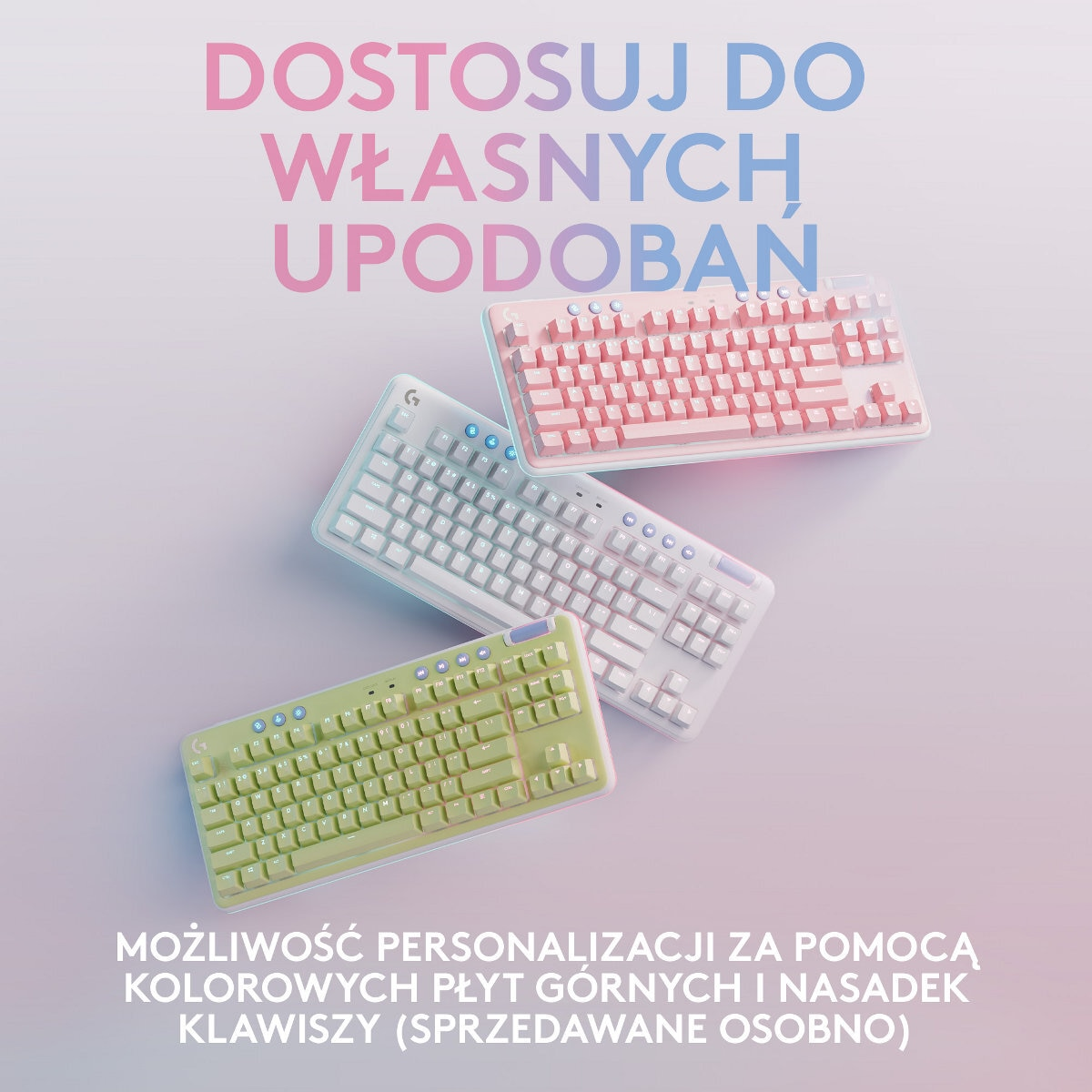Trzy klawiatury w różnych kolorach: białym, różowym i zielonym. Tekst: 'DOSTOSUJ DO WŁASNYCH UPODOBAŃ'.