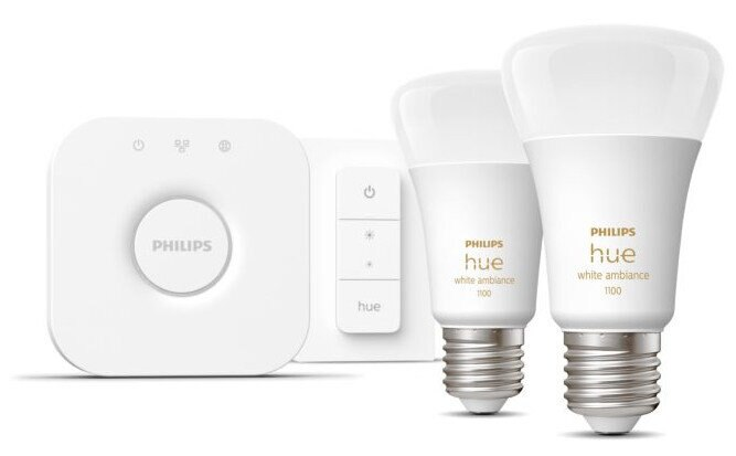 Biały zestaw smart home z dwiema żarówkami i panelem sterowania.