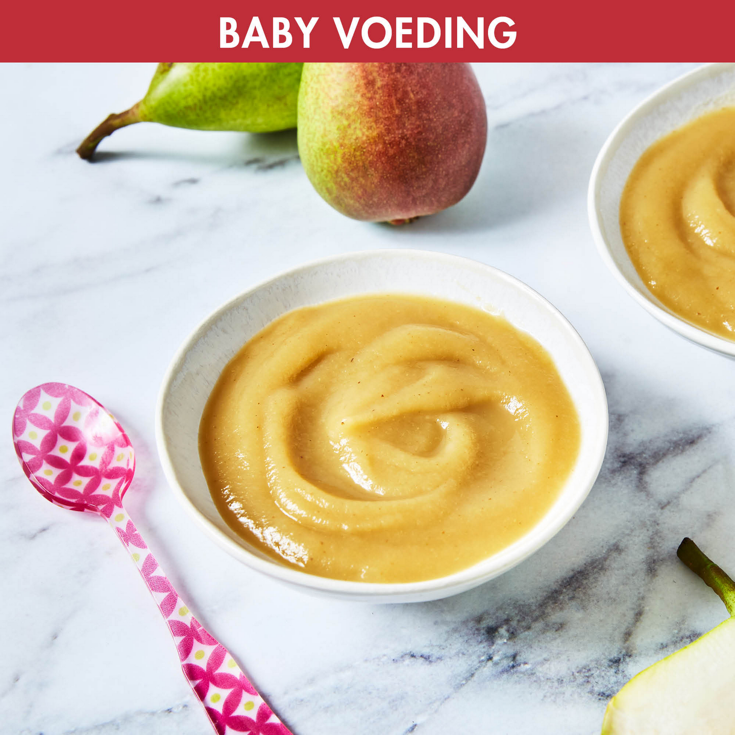 Baby food in a white bowl, pears in the background.