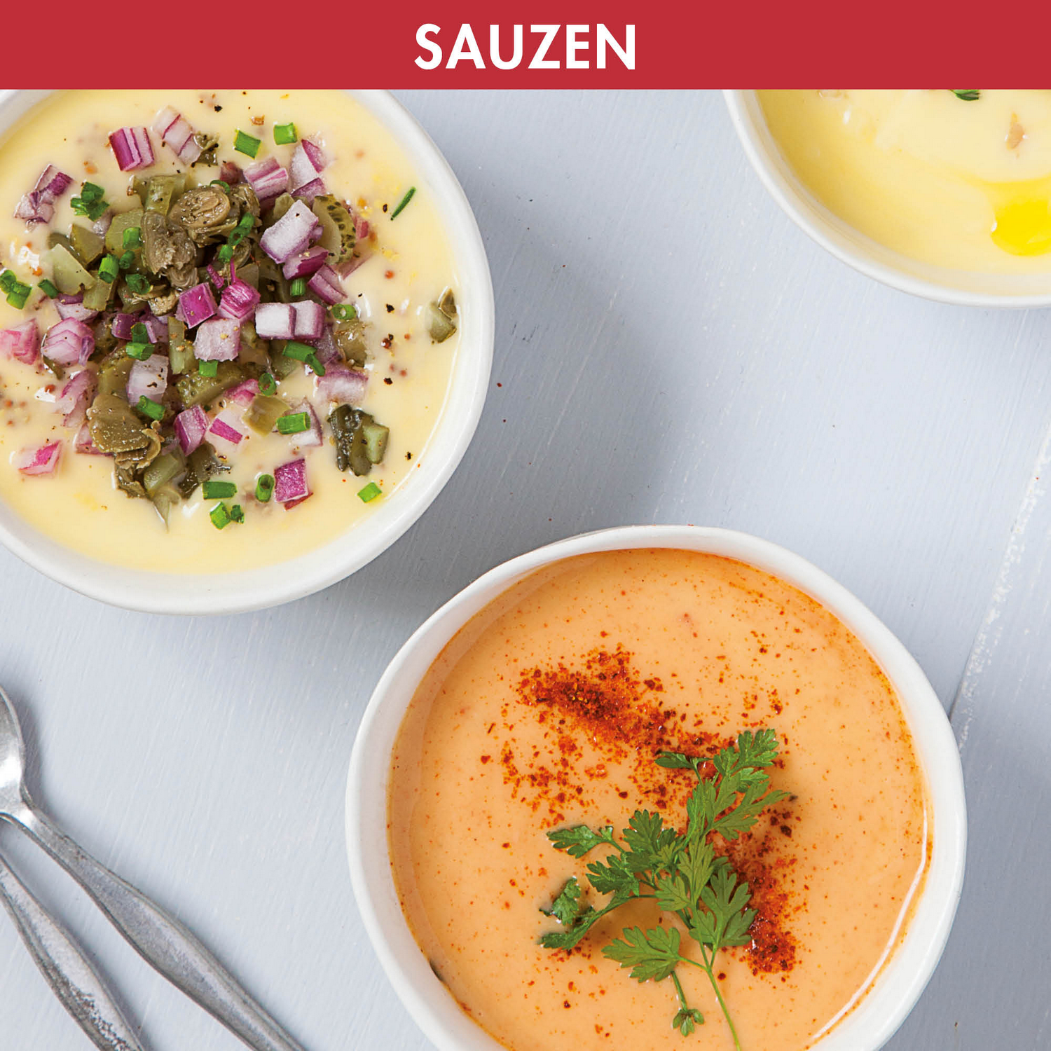 Three bowls of sauce with different toppings on a white surface.