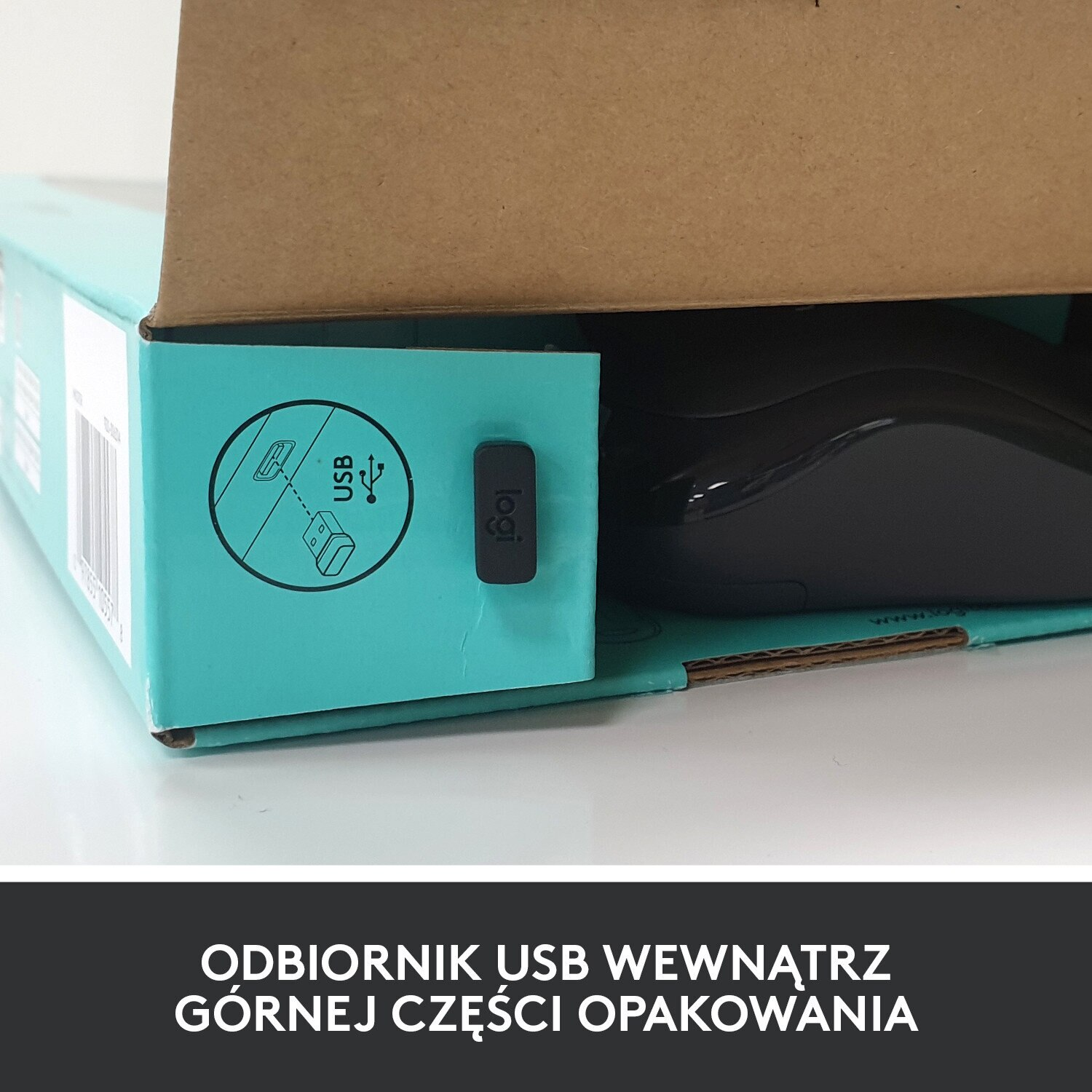 Odbiornik USB w otwartym pudełku. Tekst: Odbiornik USB w górnej części opakowania.