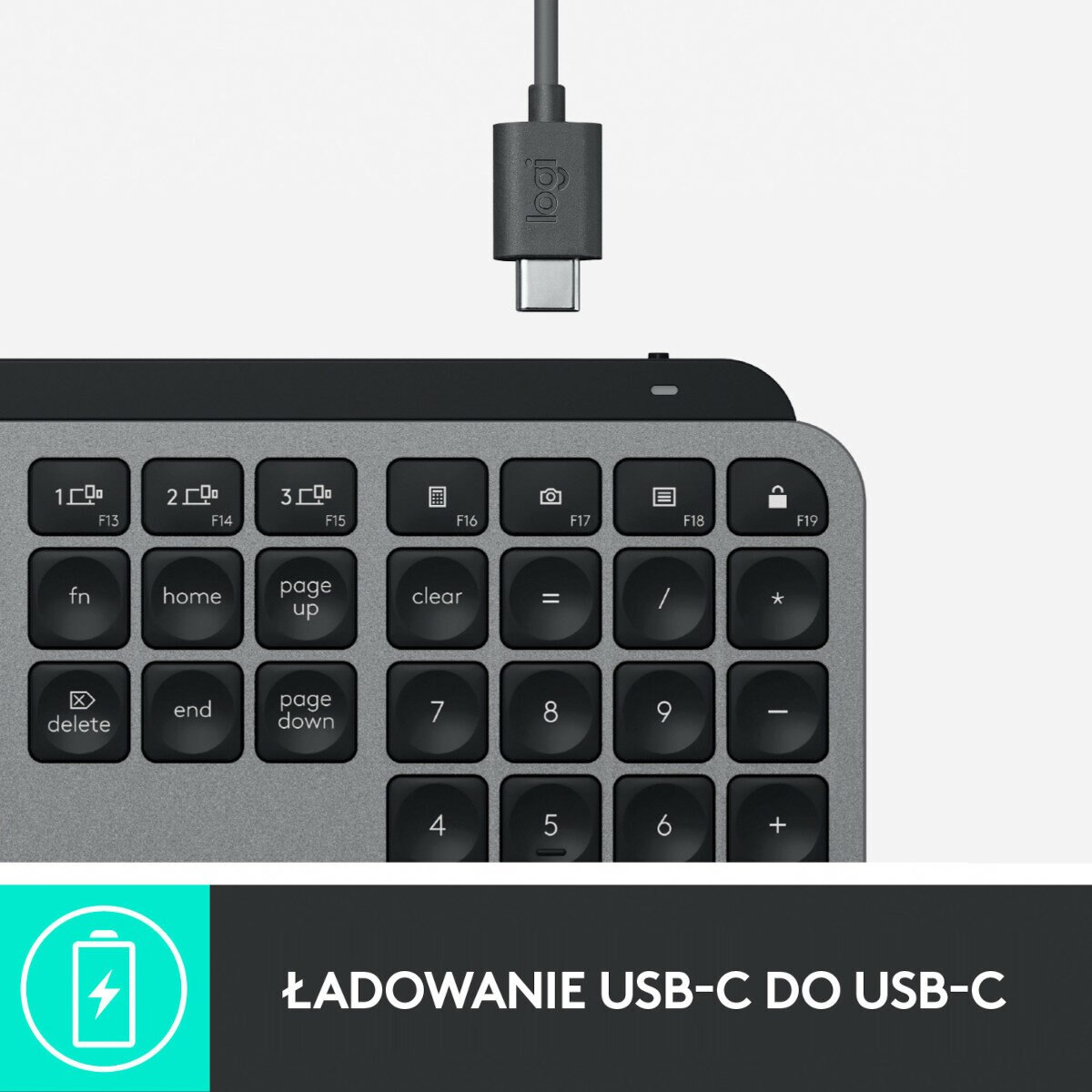 Zbliżenie szarej klawiatury z kablem USB-C i ikoną baterii na dole.