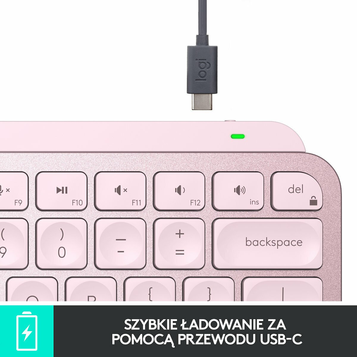 Różowa klawiatura z białymi klawiszami. Kabel USB-C jest podłączony na górze. Słowa: Szybkie ładowanie.