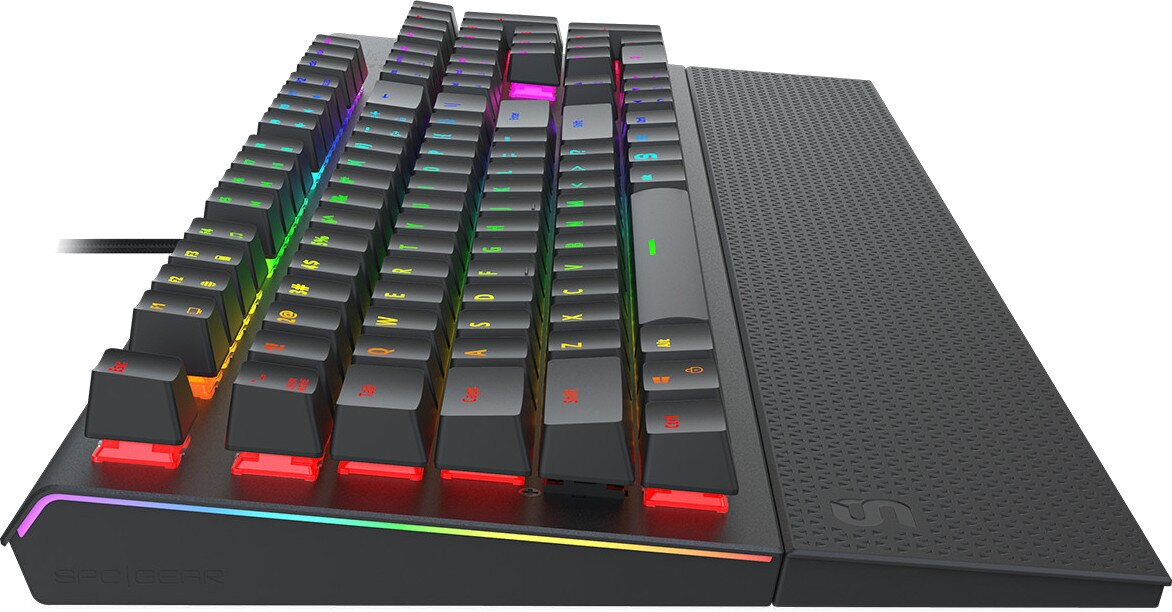 Klawiatura dla graczy z podświetleniem RGB, z klawiszami i podpórką pod nadgarstek, perspektywa ukośna.