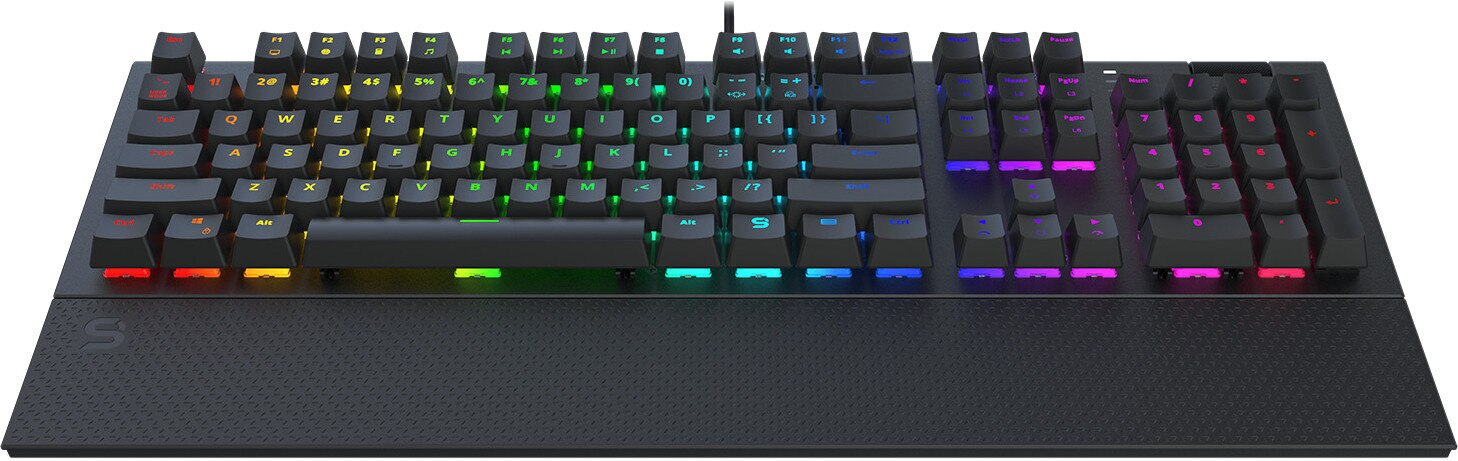 Czarna klawiatura do gier z tęczowymi klawiszami. Posiada podpórkę pod nadgarstek.