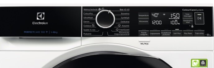 Zbliżenie panelu sterowania pralki z różnymi ustawieniami.