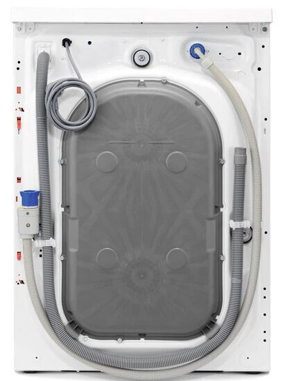 Widok z tyłu białej pralki. Widoczne są węże i połączenia.