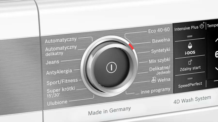 Pokrętło pralki z wieloma opcjami. Tekst jest w języku polskim.