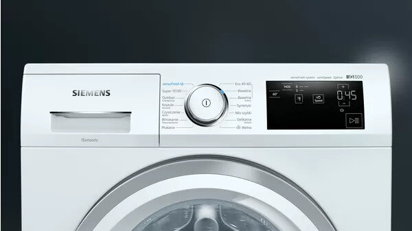 Biały panel sterowania pralki Siemens z pokrętłem i wyświetlaczem cyfrowym pokazującym czas i ustawienia.