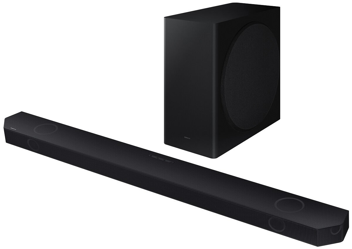 Czarny soundbar i subwoofer. Soundbar jest długi i ma głośniki, subwoofer jest sześcianem.