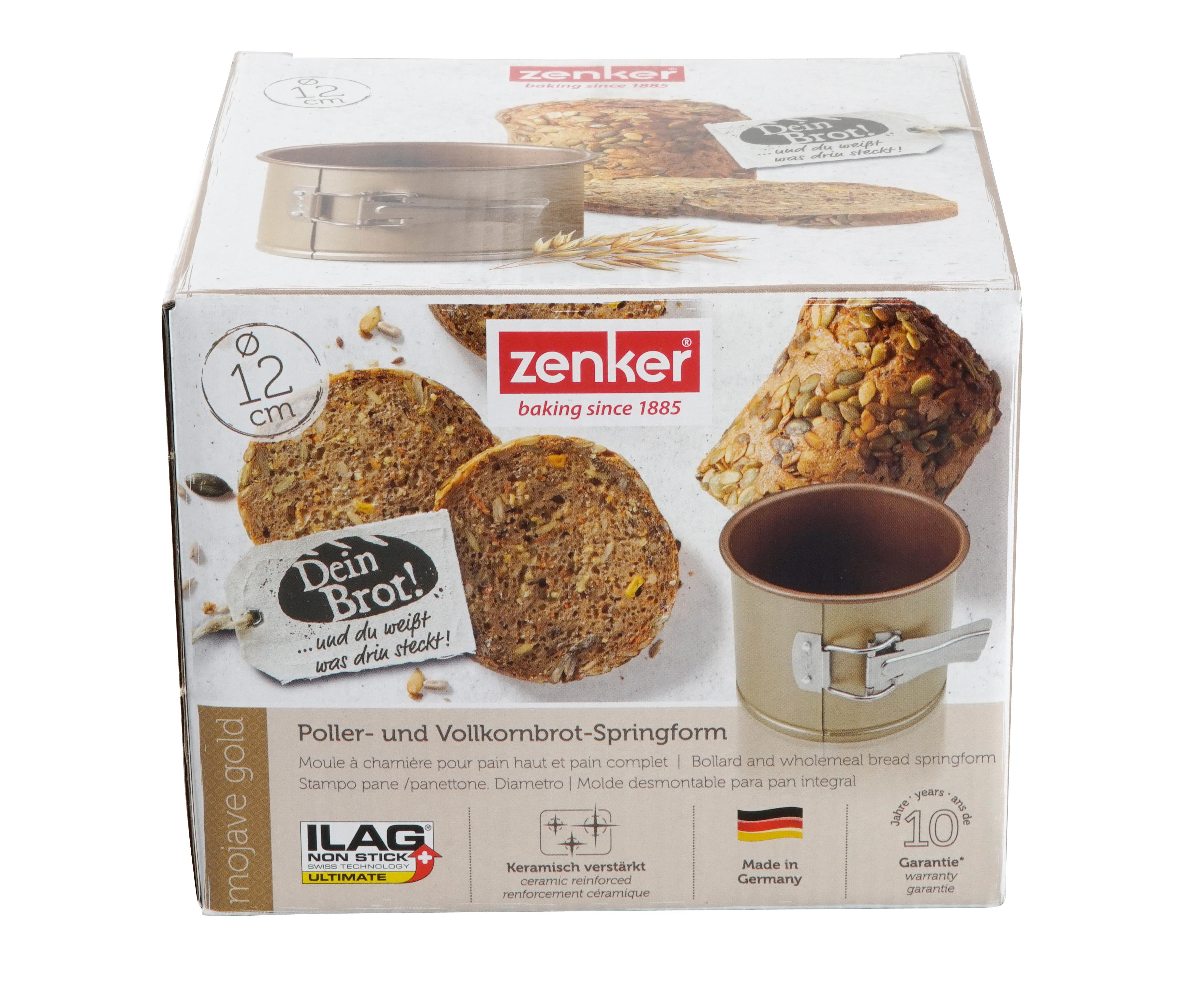 Eine Schachtel mit einer goldenen Backform und Brotscheiben mit Zutaten.